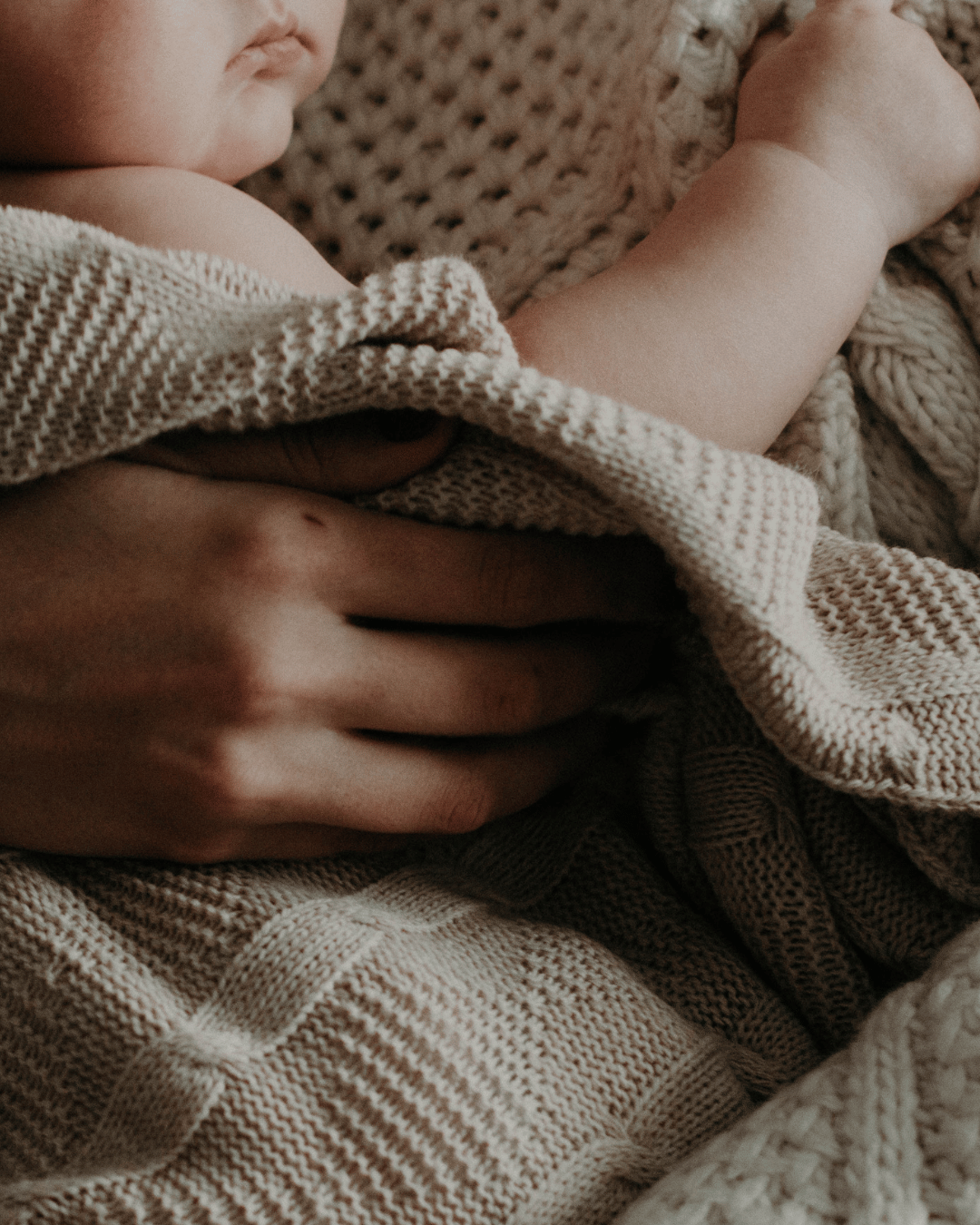 post pregnancy holding baby